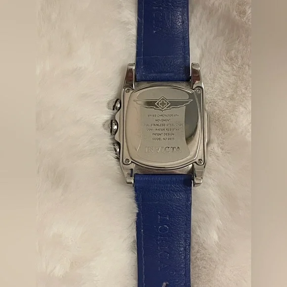 Invicta Blue and Silver Men's Watch model # 9815.GENTLY USEDWorn 1 or 2 times.